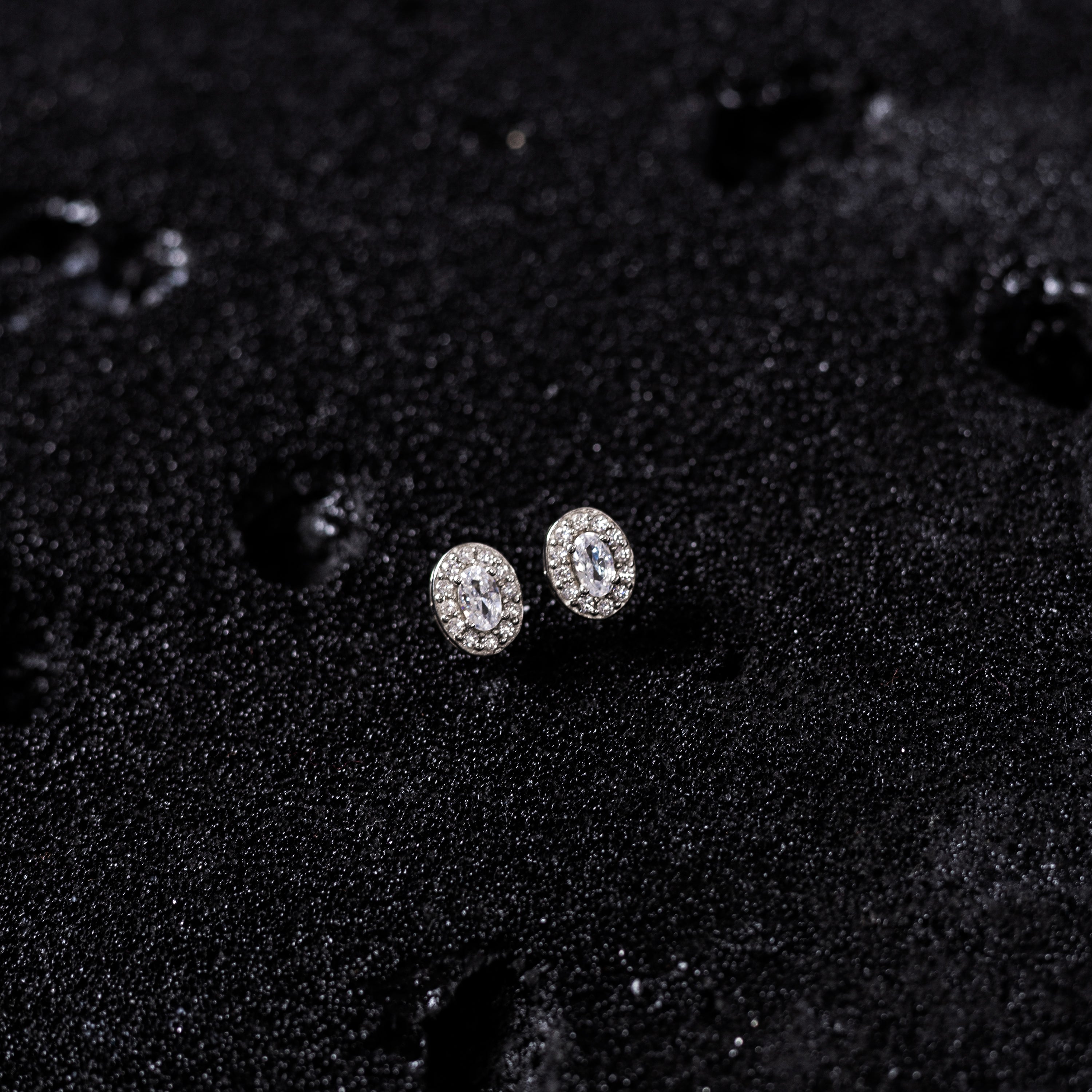 Elegant 92.5 sterling Silver stud earrings with white zorconium