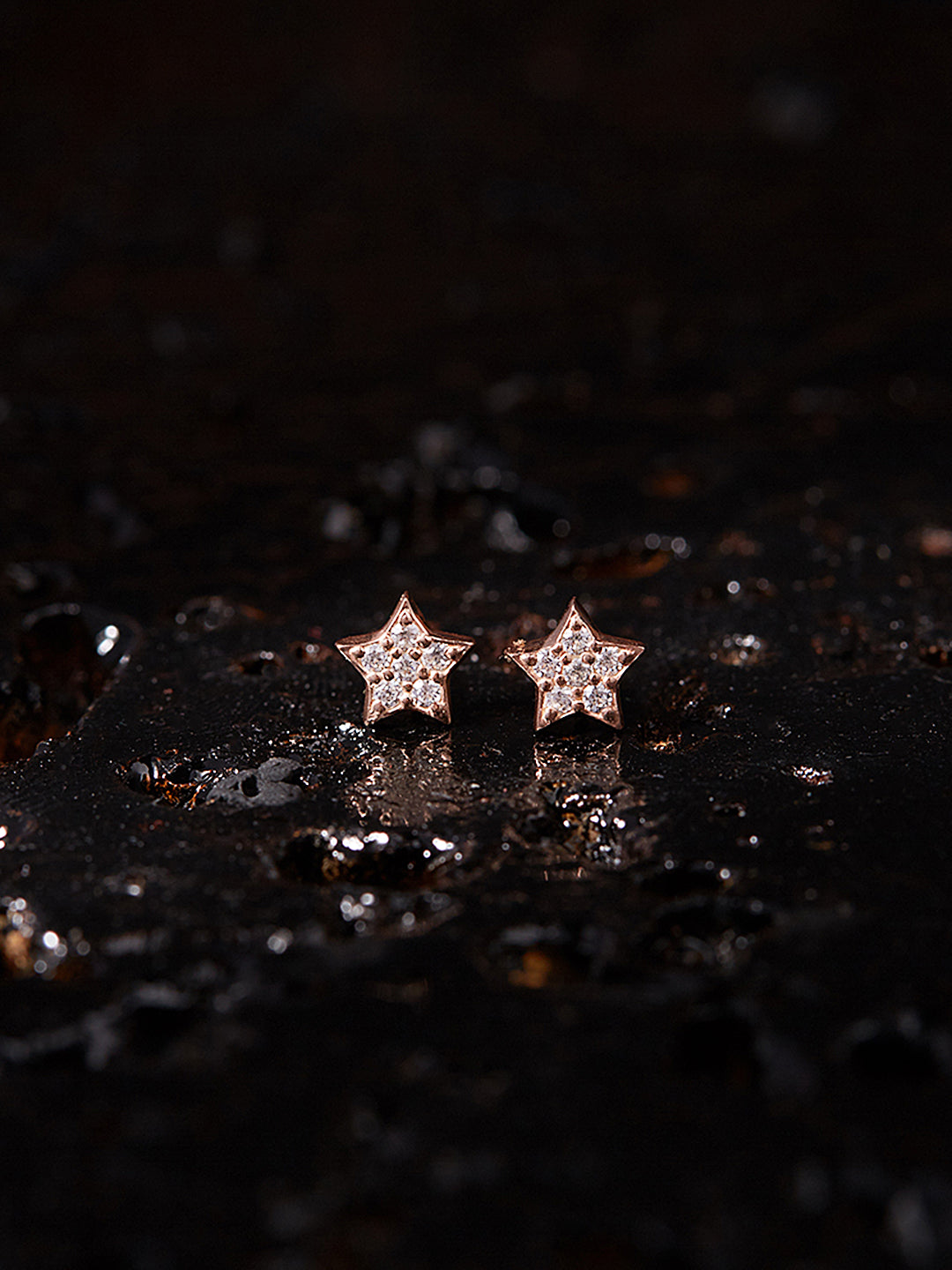 The Rose Gold Star stud earrings